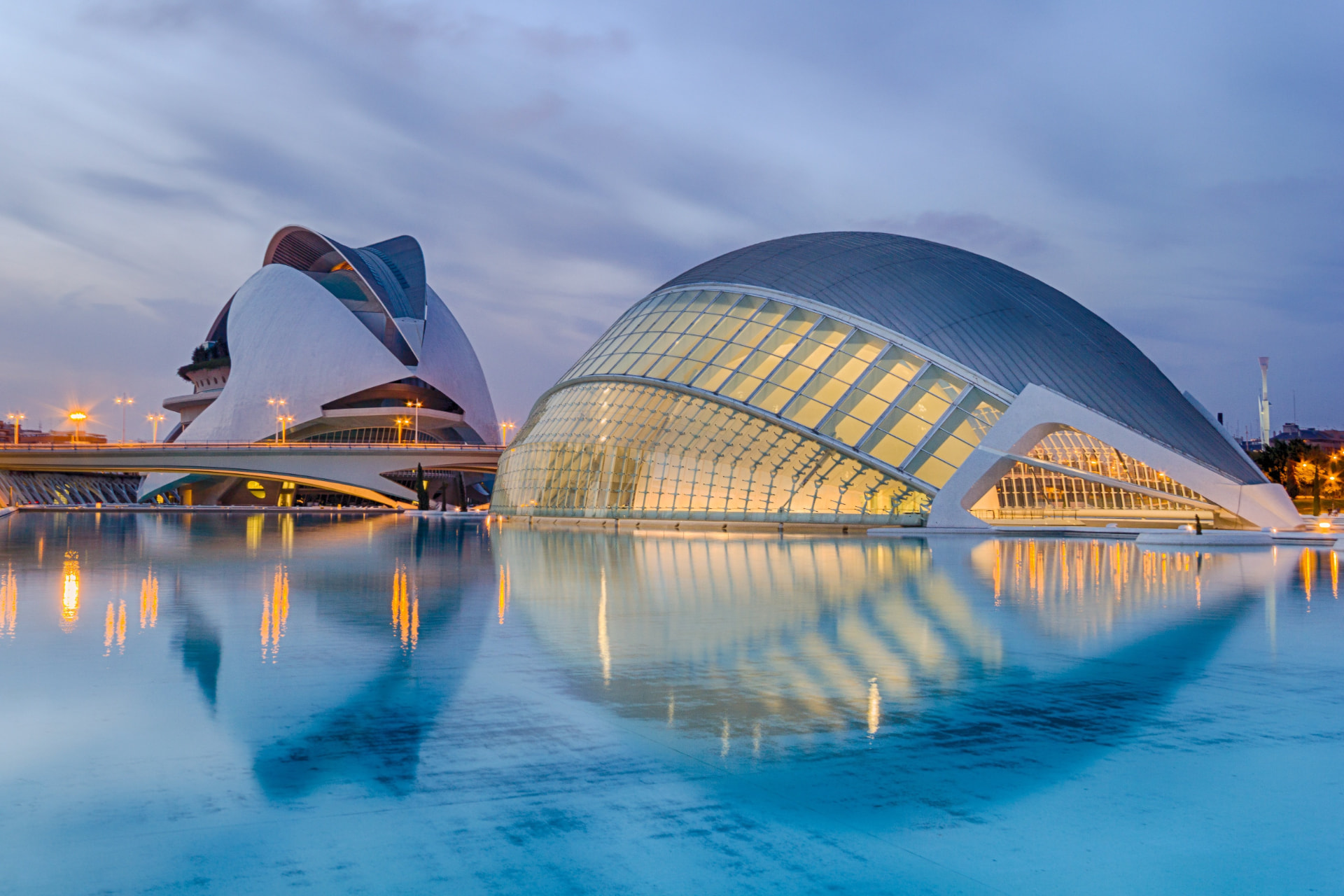 City of Arts and Sciences in Valencia reflected in water at dusk